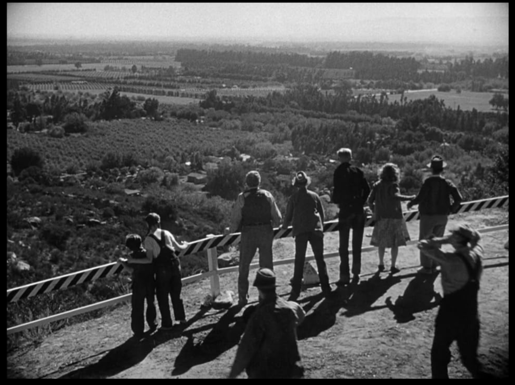 The Joad family views the "promised land" of California.